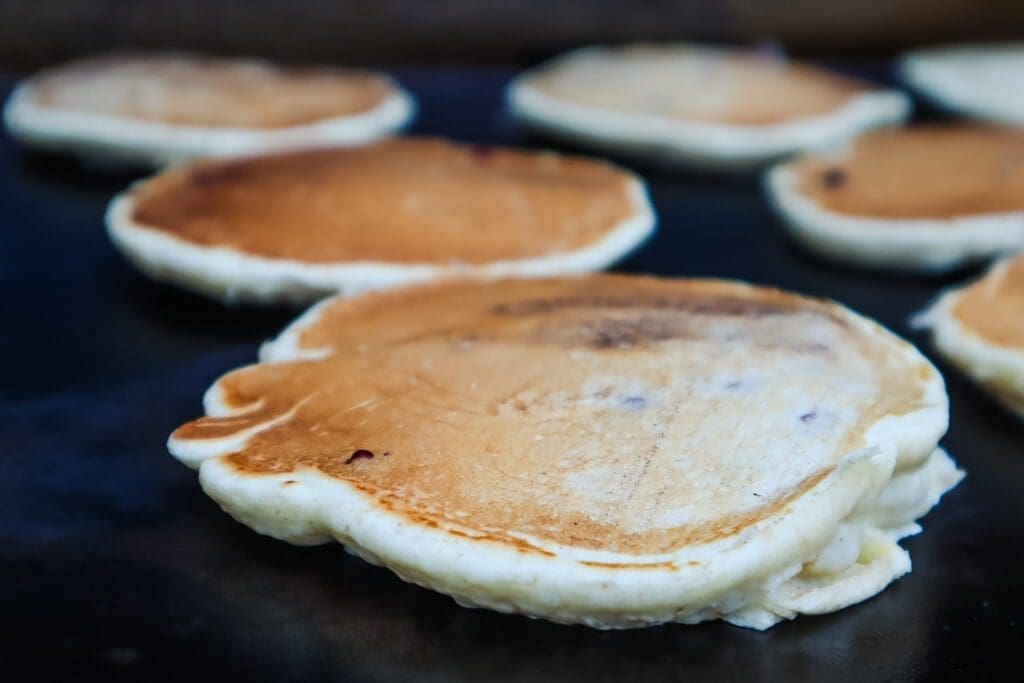 Sourdough discard pancakes on griddle