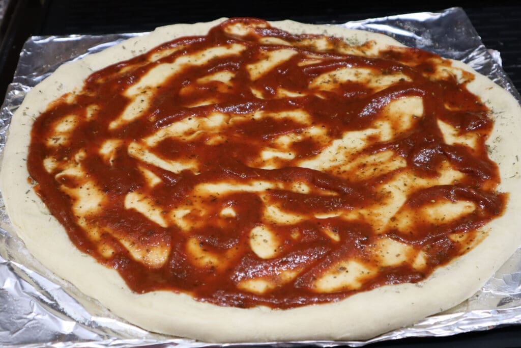 Easy Homemade PIzza pizza suase on base