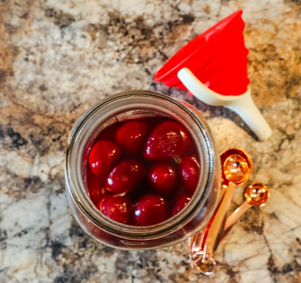 beets in a jar with pickling liquid