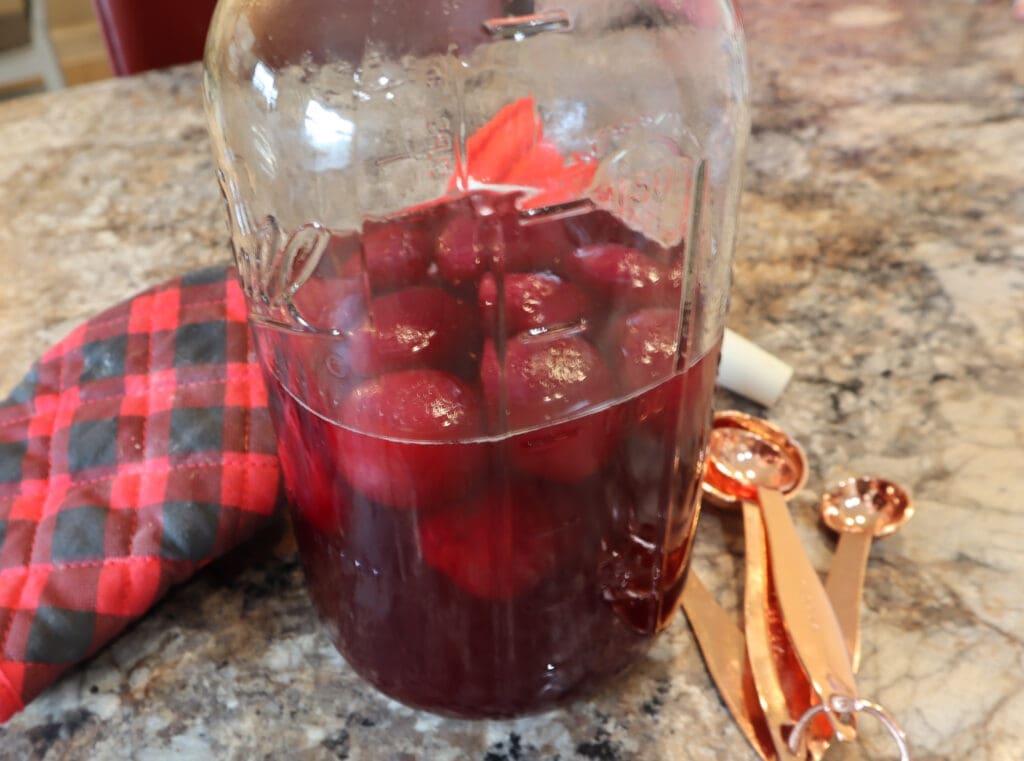 beets in a jar with pickling liquid