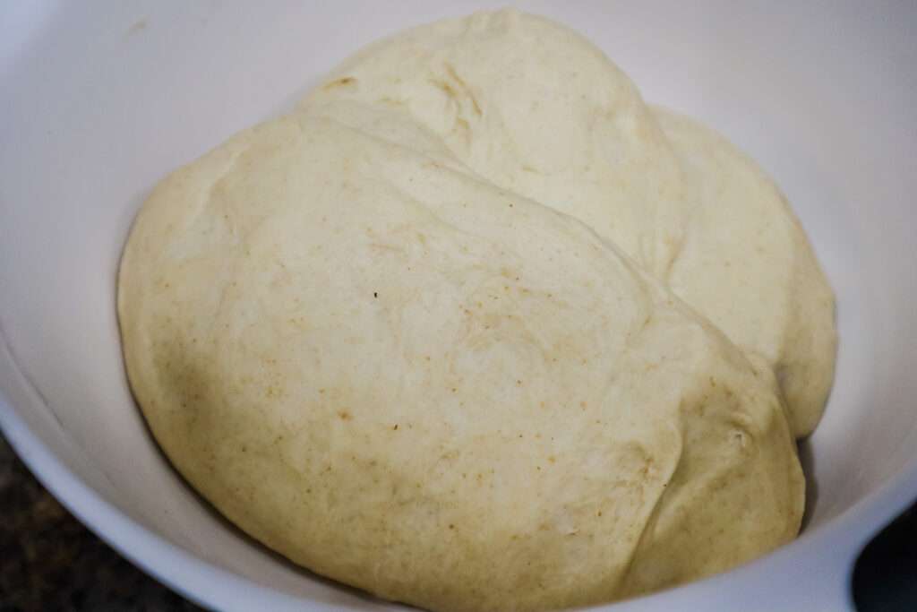 Sourdough english muffins dough doubled and fully fermented