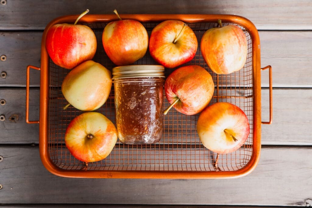 Apple Crisp Macchiato syrup in basket with apples